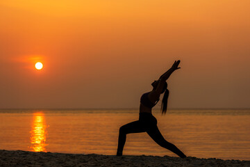 Lifestyle woman yoga exercise and pose for healthy life. Young girl or people pose balance body vital zen and meditation for workout silhouette sunset beach 