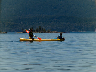 Naklejka premium two people kayaking on a lake in Patagonia Argentina
