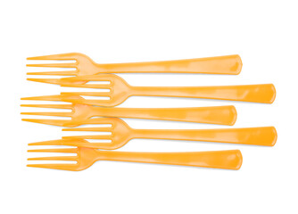 Plastic forks on white background