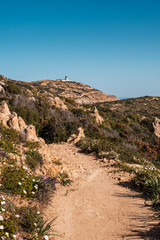 Fototapeta na wymiar Track leading to Revellata lighthouse in Corsica
