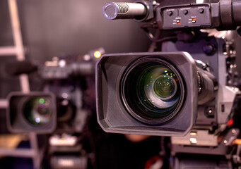 Fototapeta na wymiar Professional digital video camera in TV studio.
