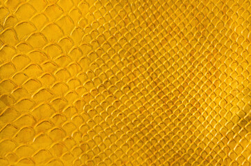 texture yellow material imitation leather close-up
