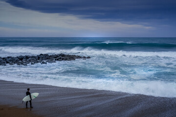 Surfer at the beach, France