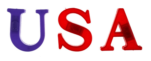 The word USA is lined with multicolored plastic letters isolated on white background.
