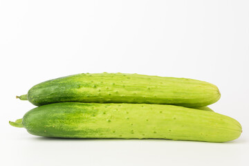 Fresh cucumbers on white background