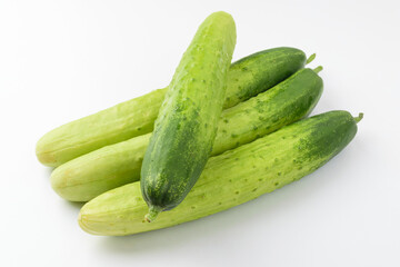 Fresh cucumbers on white background
