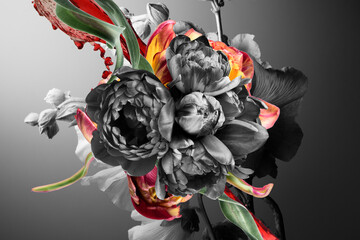 black and white flower buds and graphic elements on a gray background, abstract floral composition.