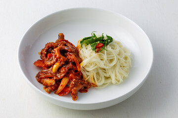 Spicy Squid Stir Fry which is called Ojingeo Bokkeum with thin white noodle