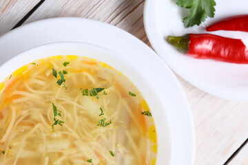 A bowl of healthy chicken noodle soup