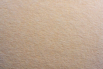 Colored paper with strong structure as a background, photographed in the studio