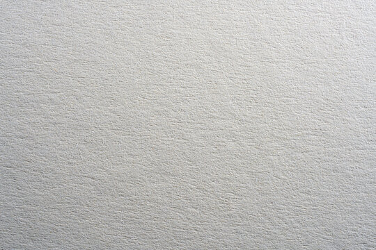 Colored paper with strong structure as a background, photographed in the studio