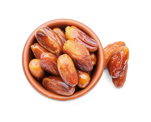 Bowl with sweet dried dates on white background