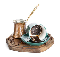 Jezve and cup with spent coffee grounds for fortune telling on white background