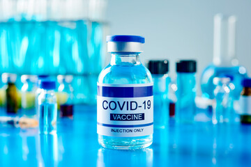 simulated covid-19 vaccine vial on a laboratory