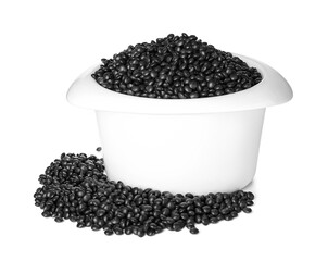 Fototapeta na wymiar Bowl with black lentils on white background