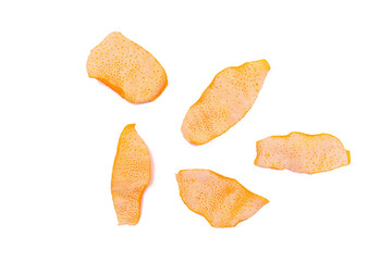 Dried orange peels isolated on a white background, close-up