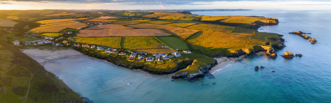 Aerial panorama of Porthcothan Bay and rugged Cornish coastline at dawn, Cornwall, England, United Kingdom