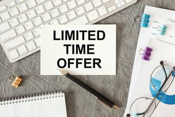 Limited time offer is written in a document on the office desk