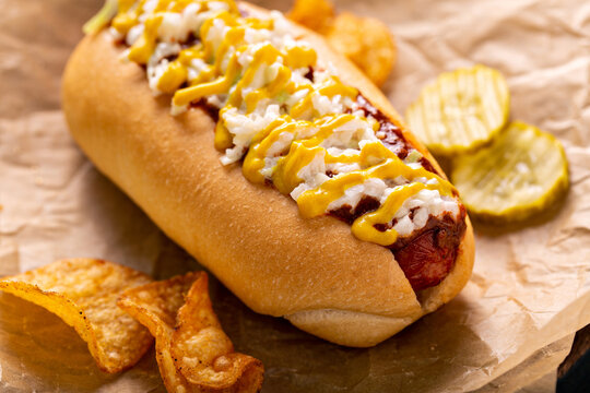 Chili Hot Dog With Onion And Mustard