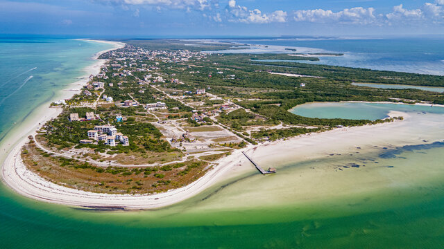 Aerial of the turquoise waters and white sands of Holbox island, Yucatan, Mexico