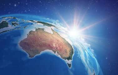 Sunrise through clouds, upon a high detailed satellite view of Planet Earth, focused on Australia. 3D illustration - Elements of this image furnished by NASA