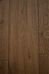 Naklejka premium Background, texture, design. Close-up of patterned brown wooden planks.