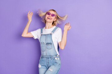 Photo of nice optimistic short hairdo blond lady dance wear spectacles white t-shirt isolated on violet background