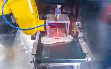 robotic machine measure the rubber soles
