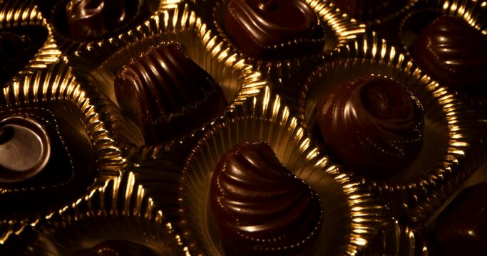 rotating chocolate candy box. golden packaging