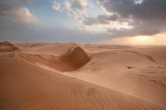 Sand Dunes At Sunset In The Wahiba Sands Desert, Oman, Middle East