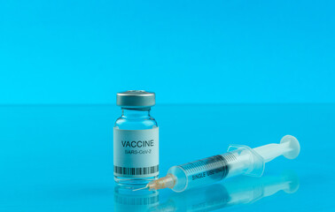 Coronavirus vaccine vial and medical syringe