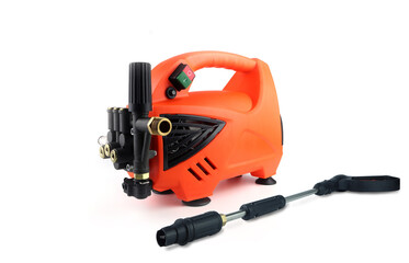 portable high pressure washer and nozzle spray gun are on the white floor and white background