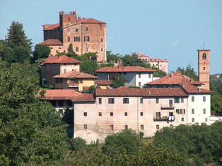 Fototapeta na wymiar the medieval castles of Piedmont are very beautiful with brick fortifications, towers and lace and full of battlements.