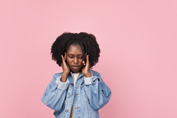 African-american woman portrait isolated on pink studio background with copyspace