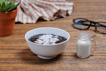 Black sticky rice porridge, a favorite breakfast for Indonesians