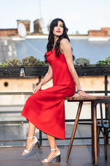 Woman in red dress outdoor