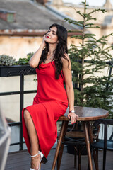 Woman in red dress outdoor