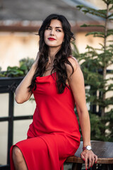 Woman in red dress outdoor