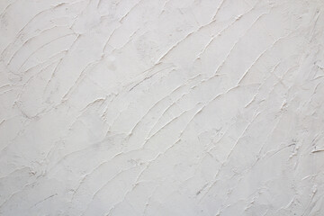 Vintage wall with white plaster horizontal texture Or background.