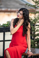 Woman in red dress outdoor