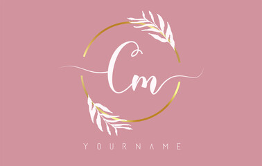 Cm c m Letters logo design with golden circle and white leaves on branches around. Vector Illustration with C and M letters.