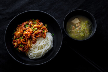Spicy Squid Stir Fry which is called Ojingeo Bokkeum with thin white noodle