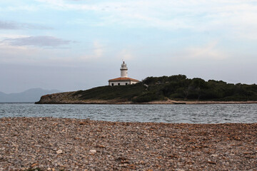 Alcanada Lighthouse (Faro de Alcanada) on the island near Alcudia, Majorca, Spain