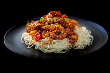 Spicy Squid Stir Fry which is called Ojingeo Bokkeum with thin white noodle