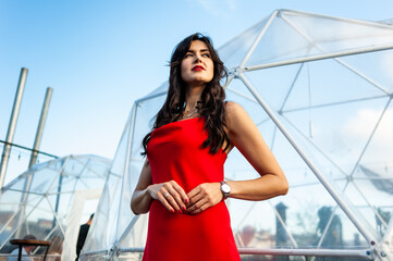 Woman wearing red dress outdoor