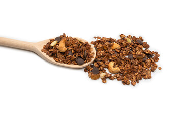 Chocolate granola cereal with nuts in a wooden spoon.