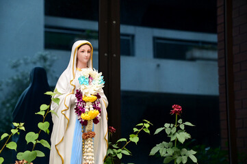 Close up of Statue of Our lady of grace virgin Mary in the church, Thailand. selective focus.