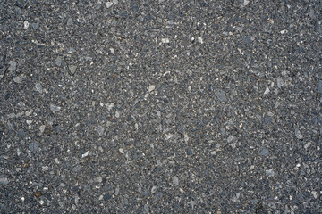 Surface rough of asphalt, Grey road with small rock, Texture Background, Top view