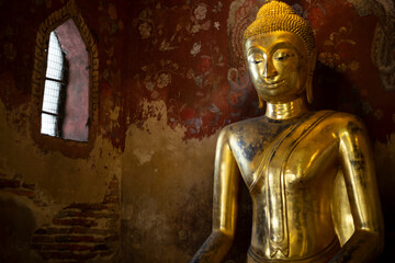 Ancient buddha statue at Wat Suthat temple ,Bangkok ,Thailand