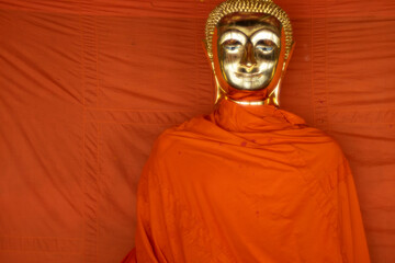Naklejka premium Ancient Ancient Golden face buddha statue at Wat Suthat temple ,Bangkok ,Thailand